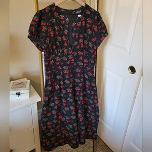 Collectif black midi dress with red rose print, deep v neckline Size M